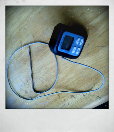 Small digital thermometer with a probe cable